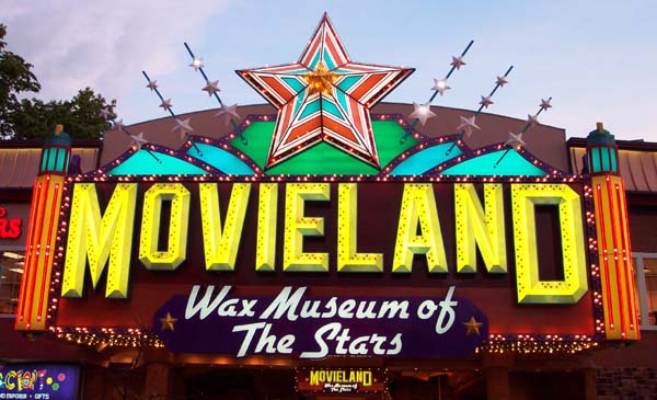 Movieland Wax Museum of the Stars sign at dusk